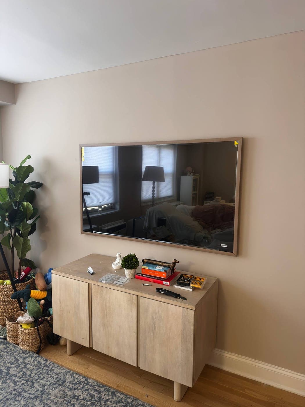 Samsung Frame TV installed on the wall in a New York City apartment